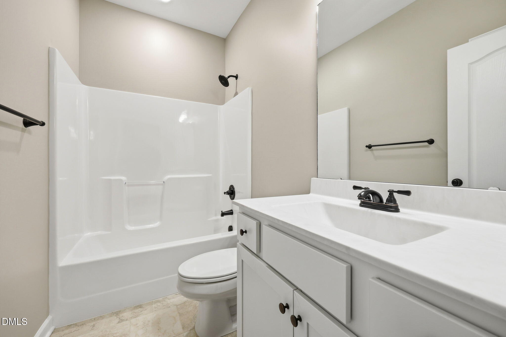 146 Seahawk Way Zebulon, NC 27597 - Photo 30 of 51 a bathroom with a sink a toilet and shower