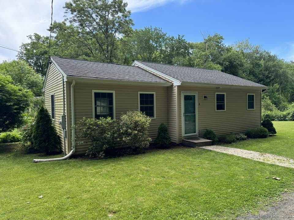 6 Manor Road Guilford, CT 06437 - Photo 1 of 1 a view of a house with a yard