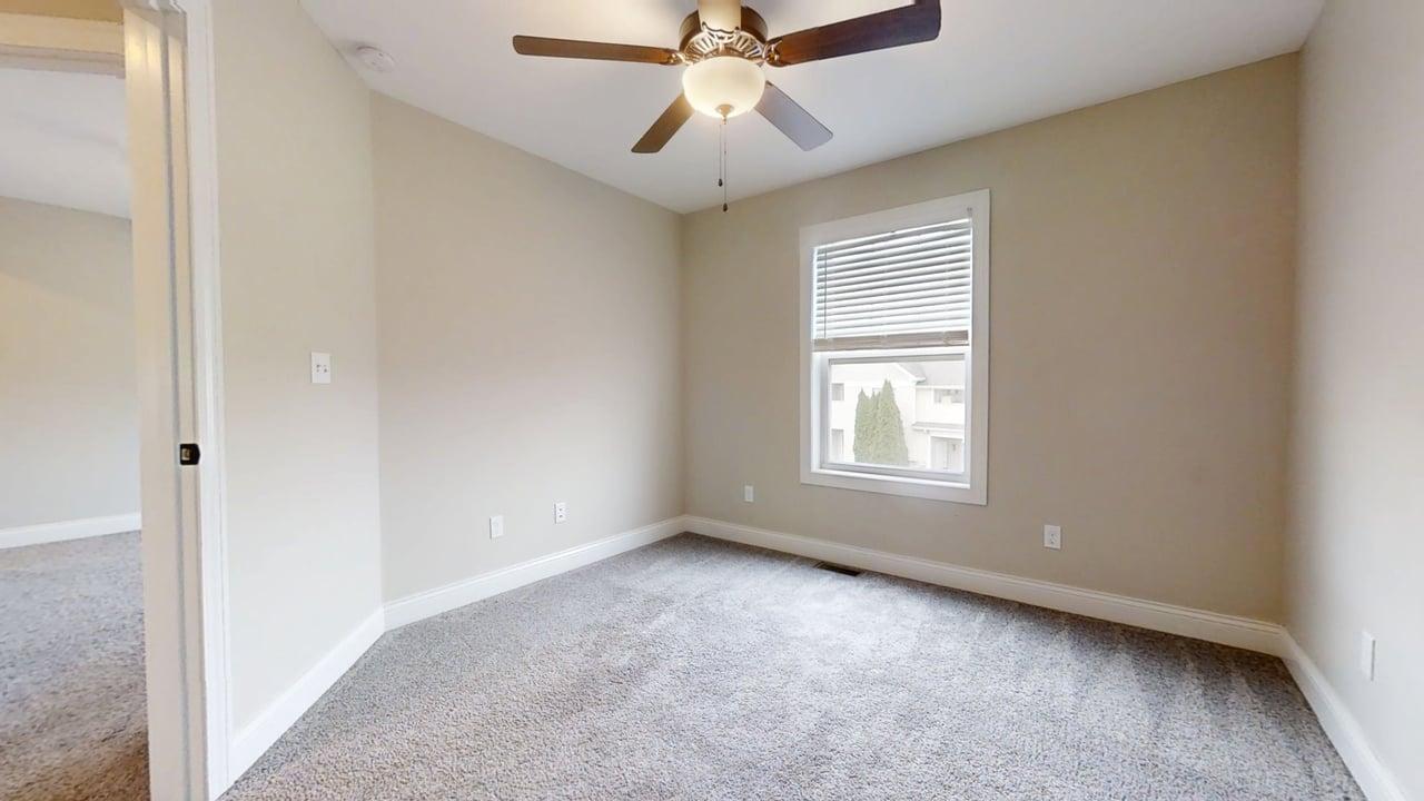 1318 Myrtle Beach Avenue Champaign, IL 61822 - Photo 23 of 29 a view of an empty room with a window