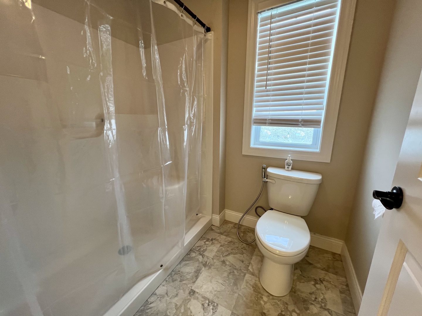 1318 Myrtle Beach Avenue Champaign, IL 61822 - Photo 25 of 29 a bathroom with a toilet and shower