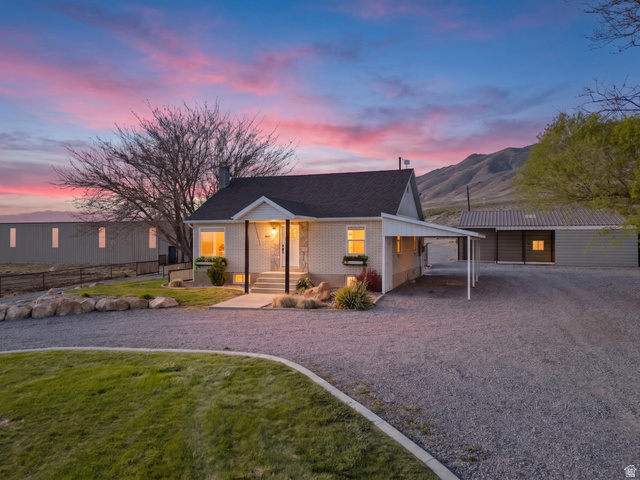 115 East 1600th Street North Santaquin, UT 84655 - Photo 1 of 52 White brick exterior with dark shingle roofing