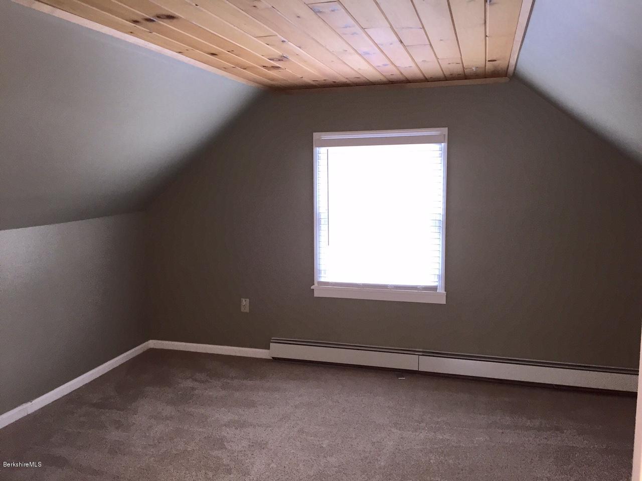 187 Swamp Road Richmond, MA 01201 - Photo 14 of 27 an empty room with a window