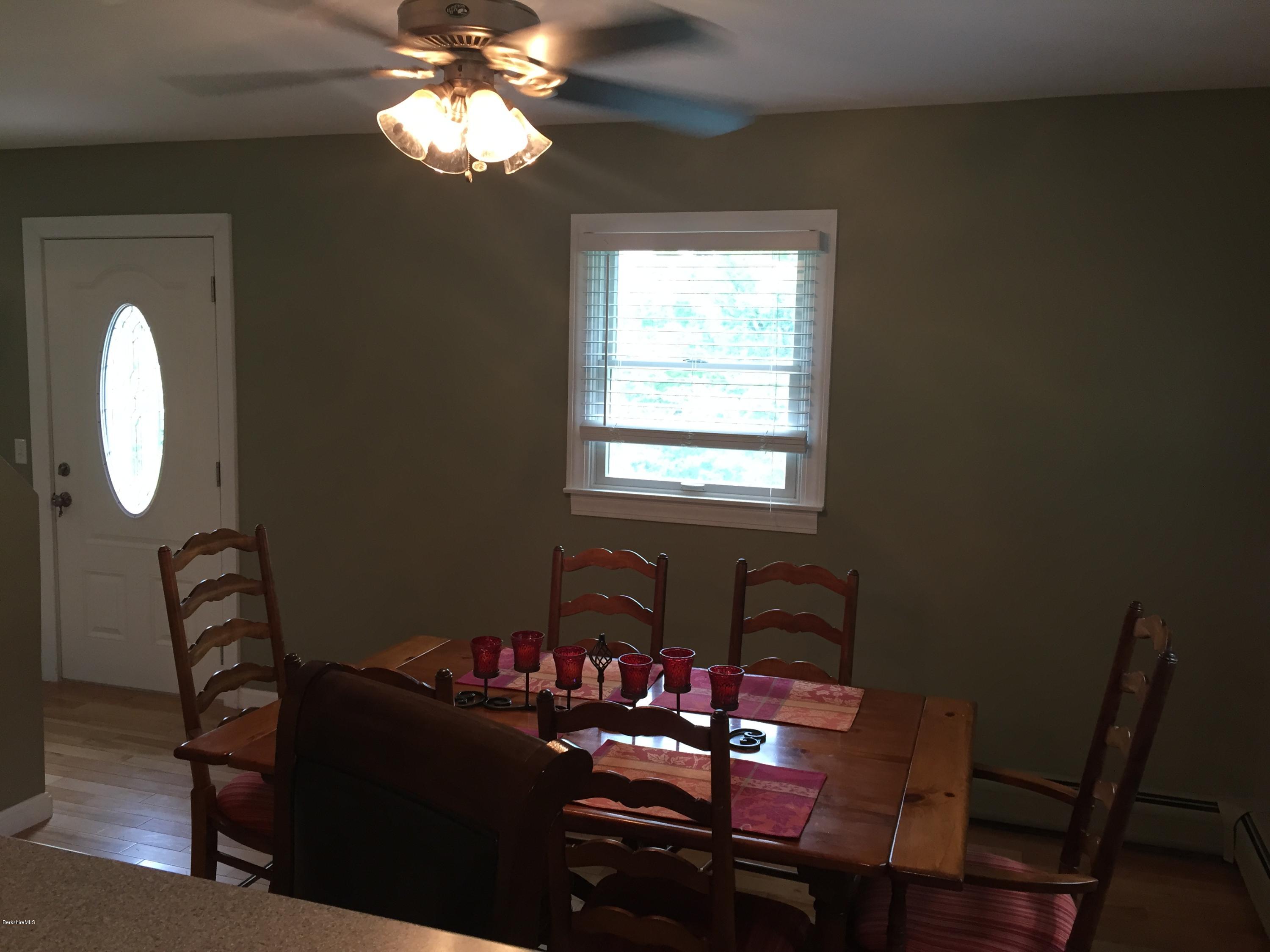 187 Swamp Road Richmond, MA 01201 - Photo 25 of 27 a living room with furniture and a window