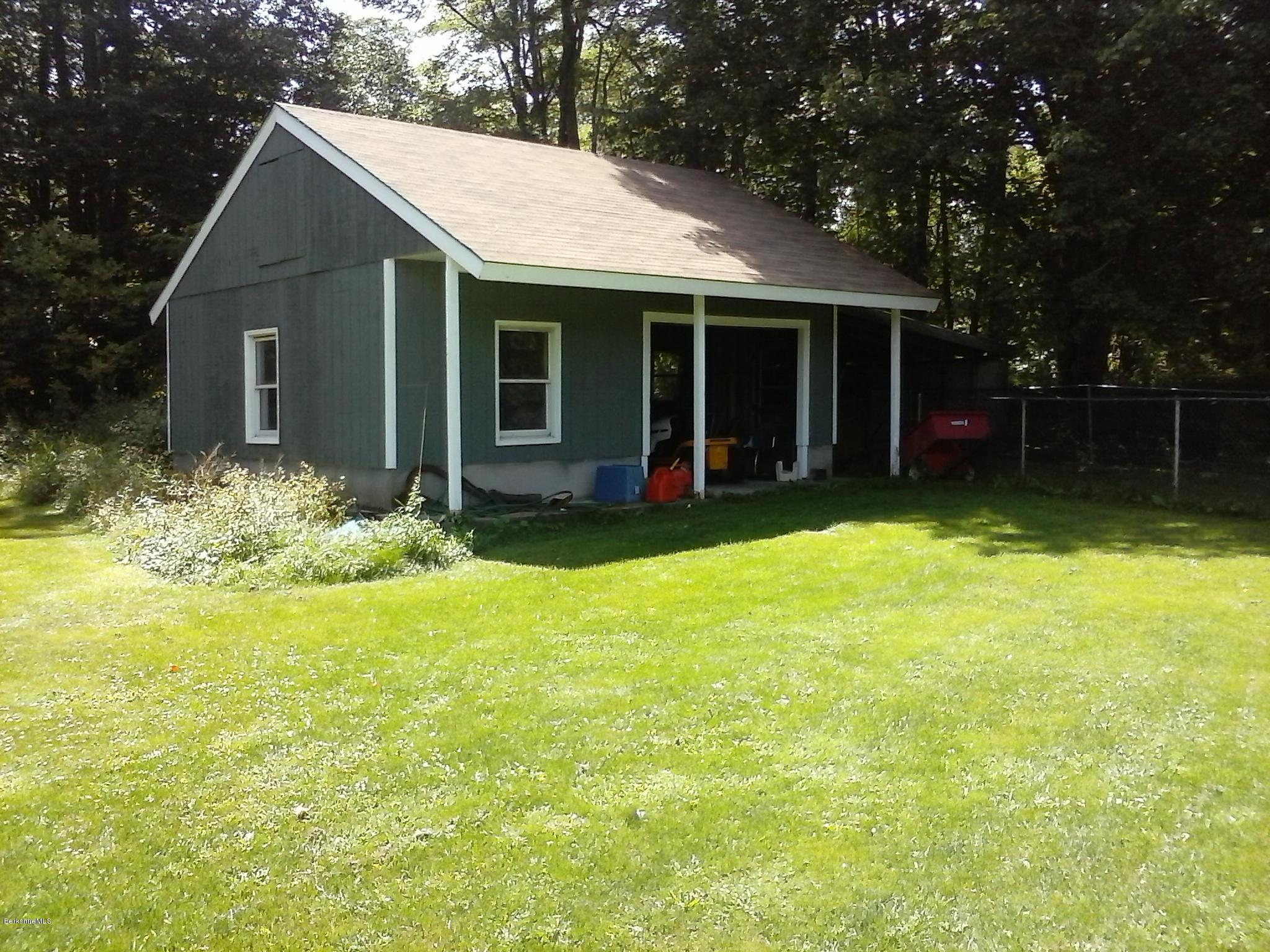 187 Swamp Road Richmond, MA 01201 - Photo 5 of 27 a view of a house with pool and garden