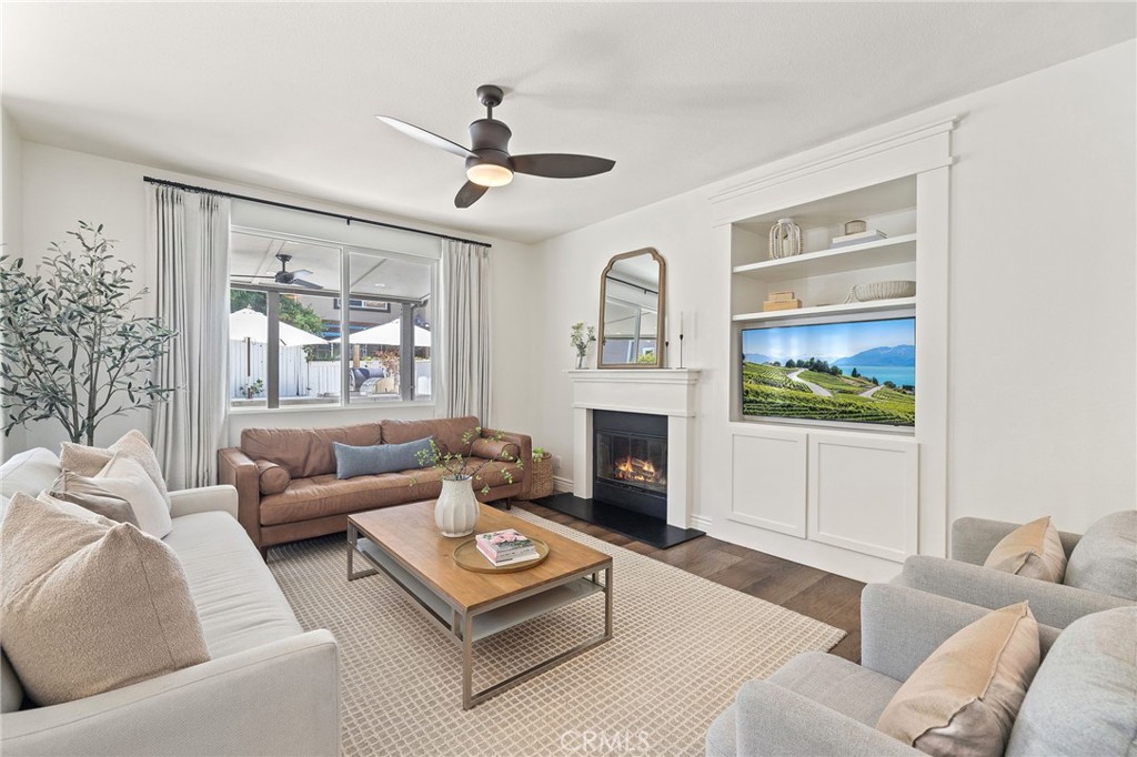 8 Danbury Ladera Ranch, CA 92694 - Photo 11 of 57 a living room with furniture fireplace and a window