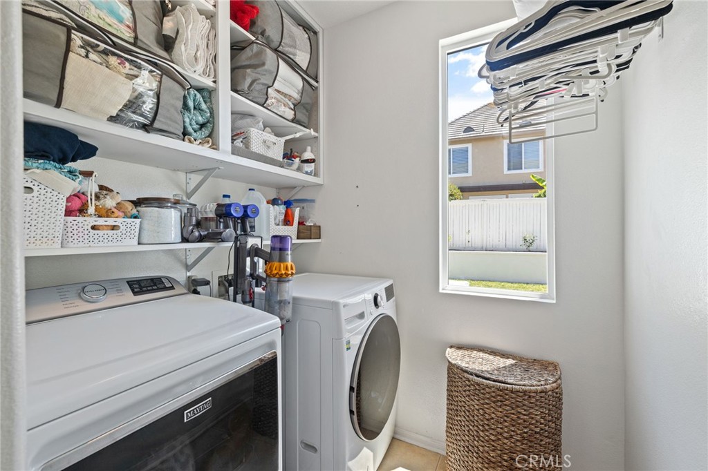 8 Danbury Ladera Ranch, CA 92694 - Photo 20 of 57 a utility room with dryer and washer