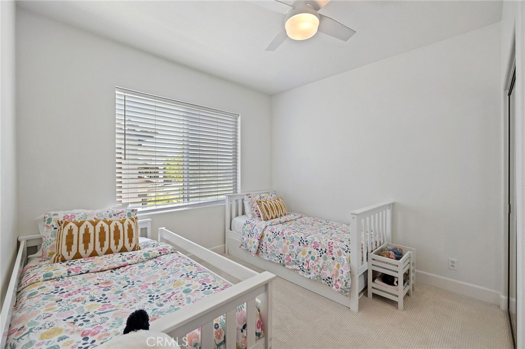 8 Danbury Ladera Ranch, CA 92694 - Photo 22 of 57 a bedroom with a bed and a window