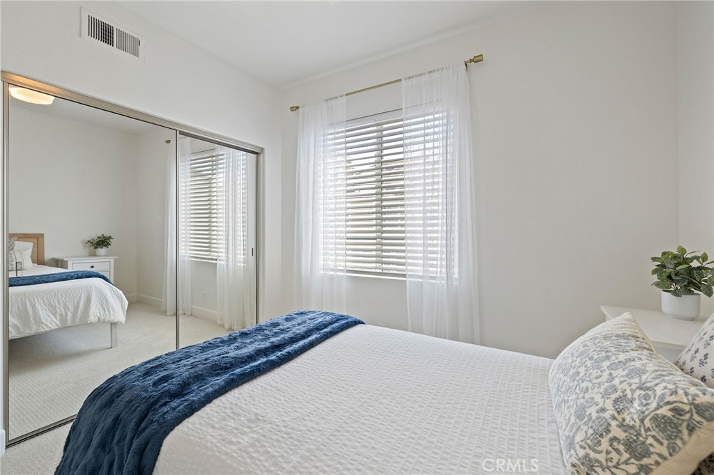8 Danbury Ladera Ranch, CA 92694 - Photo 27 of 57 a bedroom with a bed and a window