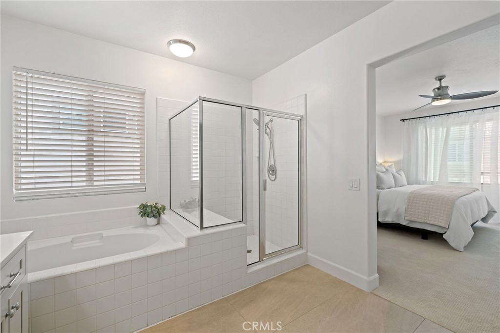 8 Danbury Ladera Ranch, CA 92694 - Photo 36 of 57 a spacious bathroom with a bathtub and shower