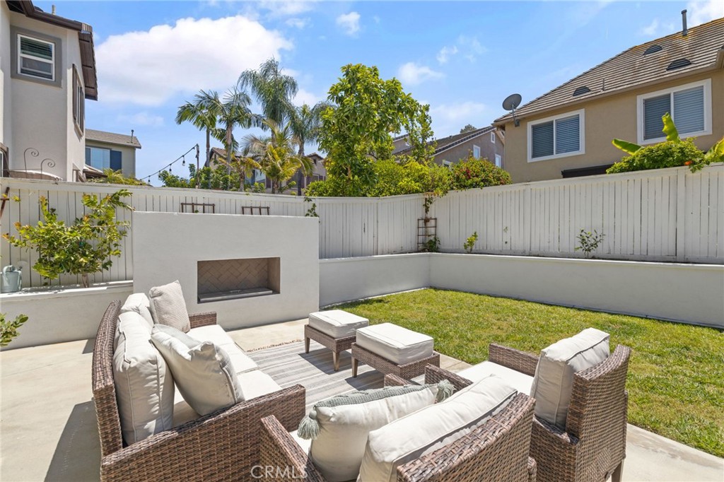 8 Danbury Ladera Ranch, CA 92694 - Photo 38 of 57 a view of a patio with couches table and chairs and potted plants