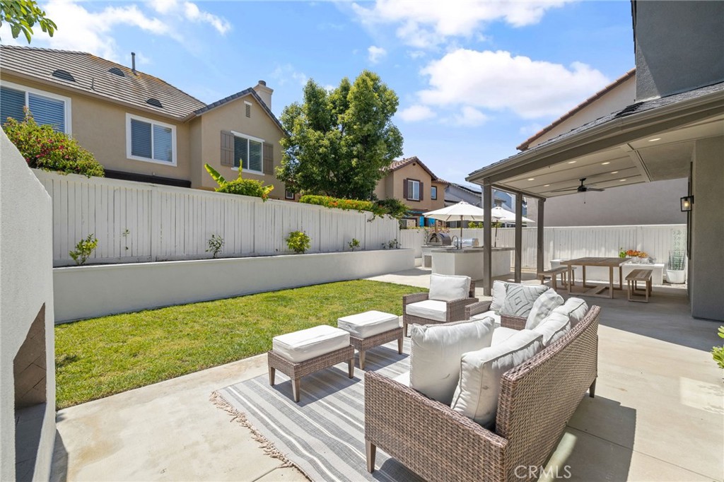 8 Danbury Ladera Ranch, CA 92694 - Photo 39 of 57 a view of a patio with couches table and chairs and potted plants