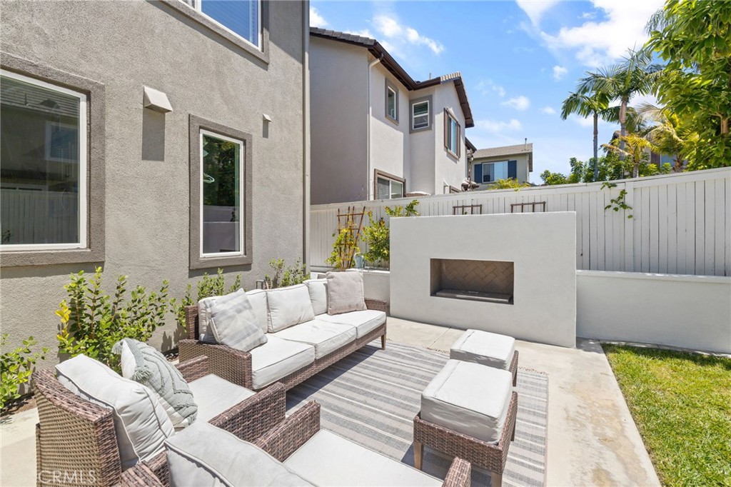 8 Danbury Ladera Ranch, CA 92694 - Photo 41 of 57 a view of a patio with couches and a fireplace