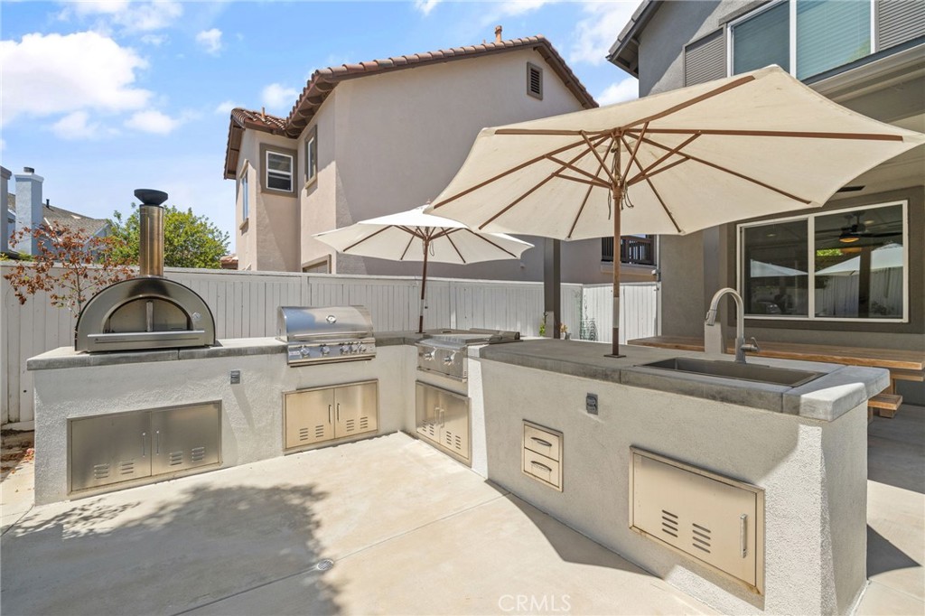 8 Danbury Ladera Ranch, CA 92694 - Photo 42 of 57 a kitchen that has a sink and a stove