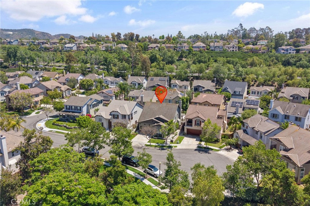 8 Danbury Ladera Ranch, CA 92694 - Photo 46 of 57 an aerial view of a city with lots of residential buildings ocean and mountain view in back