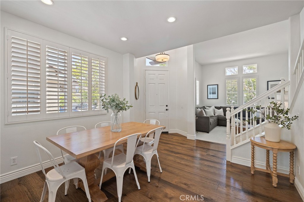 8 Danbury Ladera Ranch, CA 92694 - Photo 6 of 57 a view of a dining room with furniture and wooden floor