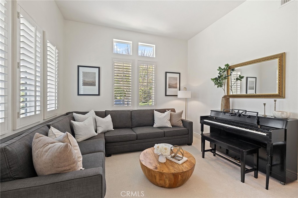 8 Danbury Ladera Ranch, CA 92694 - Photo 7 of 57 a living room with furniture and a large window
