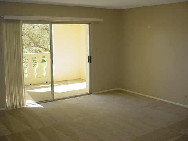 7910 East Camelback Road, Unit 204 Scottsdale, AZ 85251 - Photo 2 of 6 a view of an empty room with a window