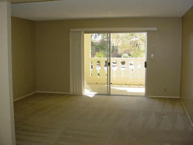 7910 East Camelback Road, Unit 204 Scottsdale, AZ 85251 - Photo 3 of 6 a view of an empty room with window