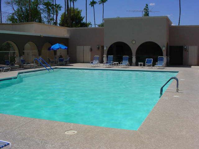 7910 East Camelback Road, Unit 204 Scottsdale, AZ 85251 - Photo 5 of 6 a front view of a house with outdoor seating