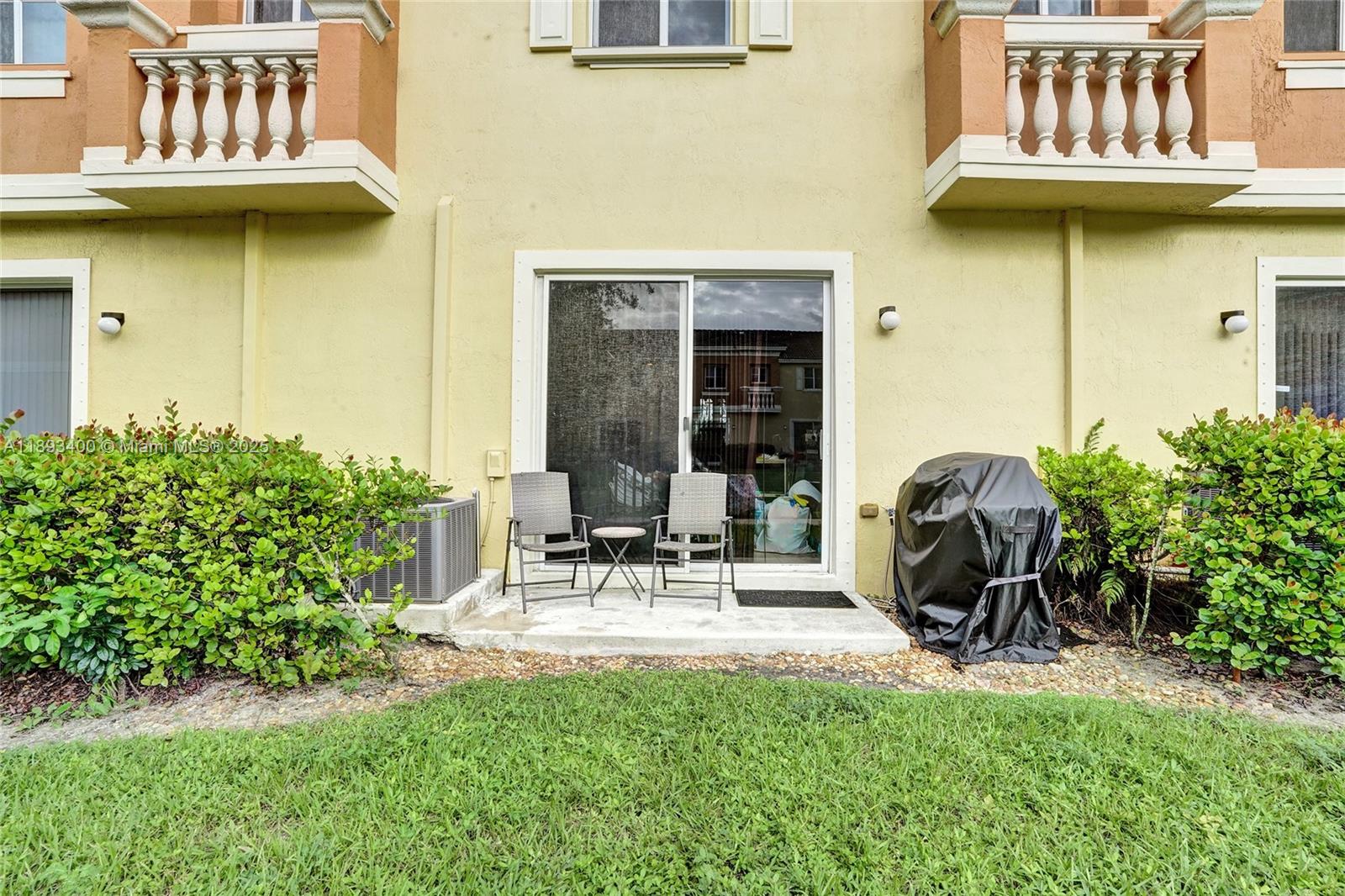 1832 Southwest 89th Terrace Miramar, FL 33025 - Photo 23 of 28 a view of outdoor space yard and patio