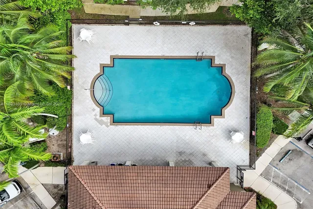 an aerial view of a house having yard