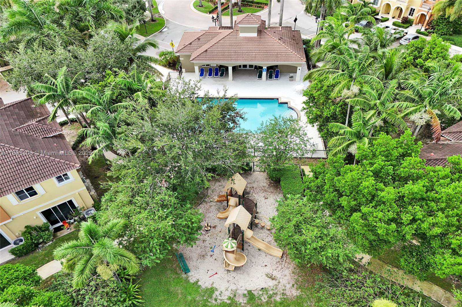1832 Southwest 89th Terrace Miramar, FL 33025 - Photo 27 of 28 an aerial view of a house with swimming pool and garden view