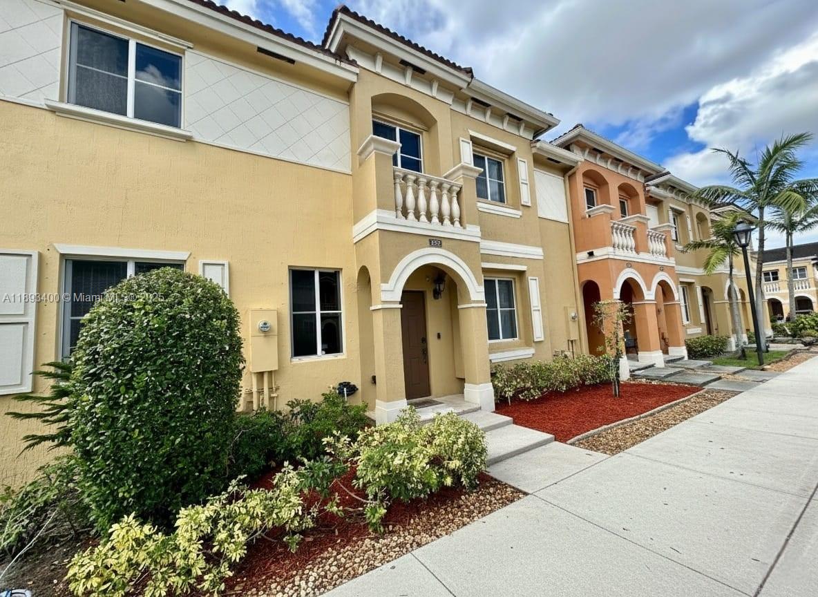 1832 Southwest 89th Terrace Miramar, FL 33025 - Photo 4 of 28 front view of white building