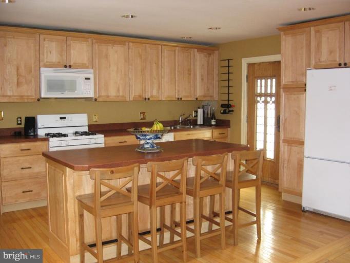 5606 Rockspring Road Baltimore, MD 21209 - Photo 2 of 5 a room with a sink appliances and cabinets