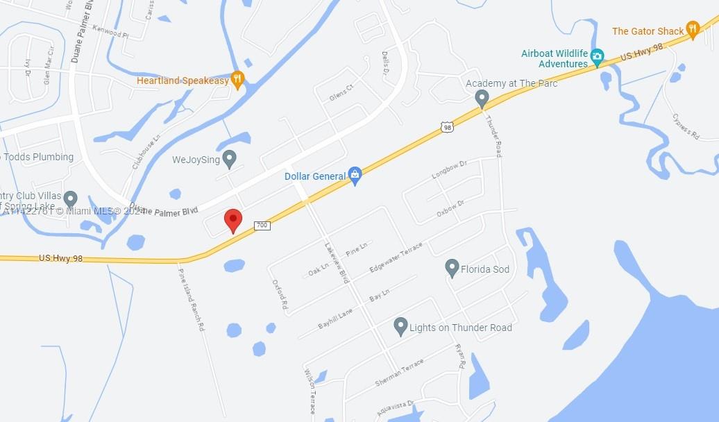 142 Friendly Circle Sebring, FL 33876 - Photo 5 of 5 a bathroom with a bathtub and a shower curtain