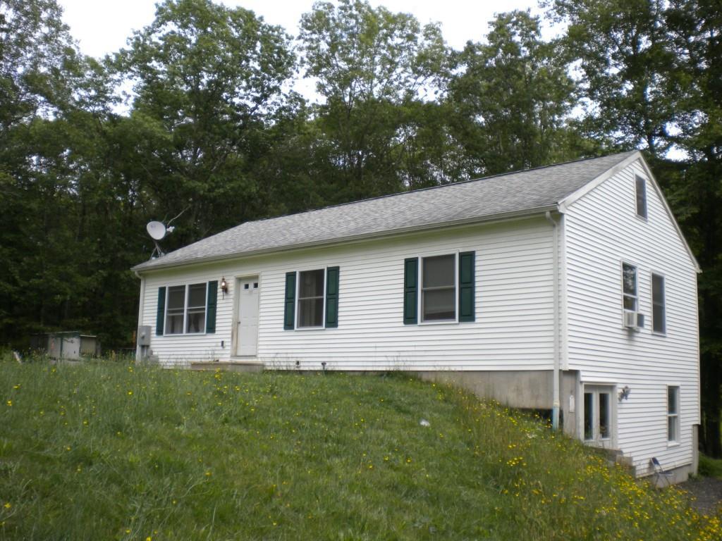 228 Spaulding Road Plainfield, CT 06374 - Photo 1 of 1 a view of a house with a backyard
