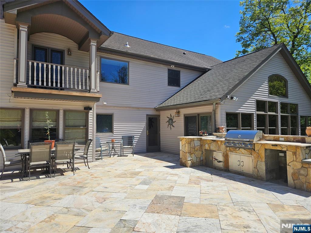 285 Chestnut Ridge Road Woodcliff Lake, NJ 07677 - Photo 9 of 46 a view of a house with sitting area and furniture