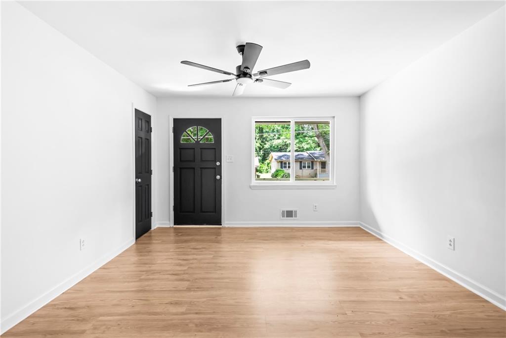 264 Howell Terrace Southwest Atlanta, GA 30331 - Photo 17 of 22 an empty room with windows and closet