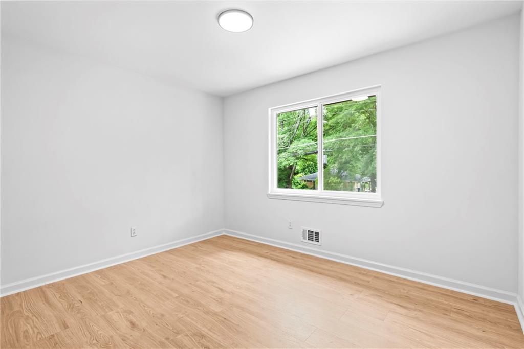 264 Howell Terrace Southwest Atlanta, GA 30331 - Photo 22 of 22 an empty room with a window