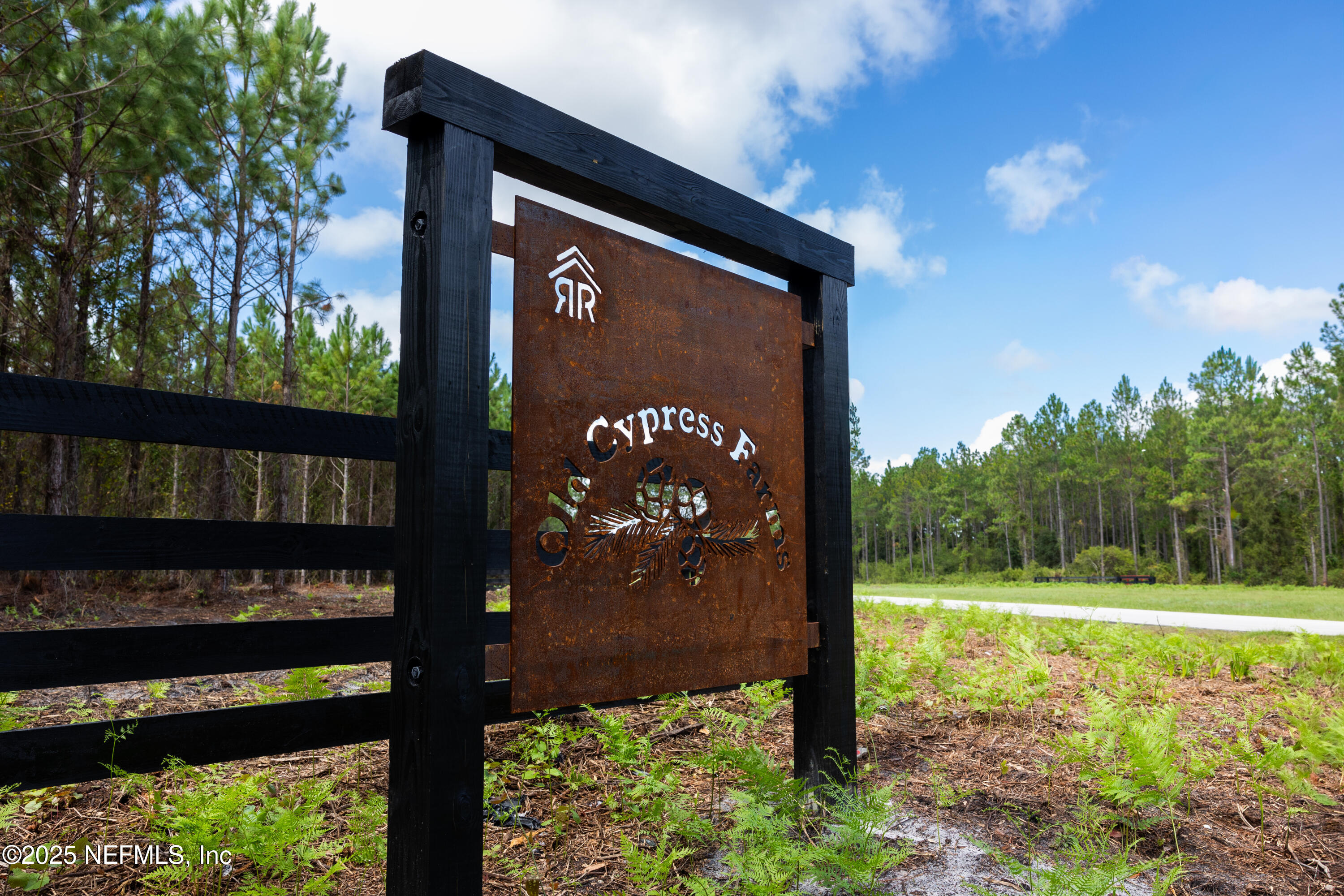 Lot 12 Southwest County Road 225 Starke, FL 32091 - Photo 7 of 12 a sign that is on the side of the road
