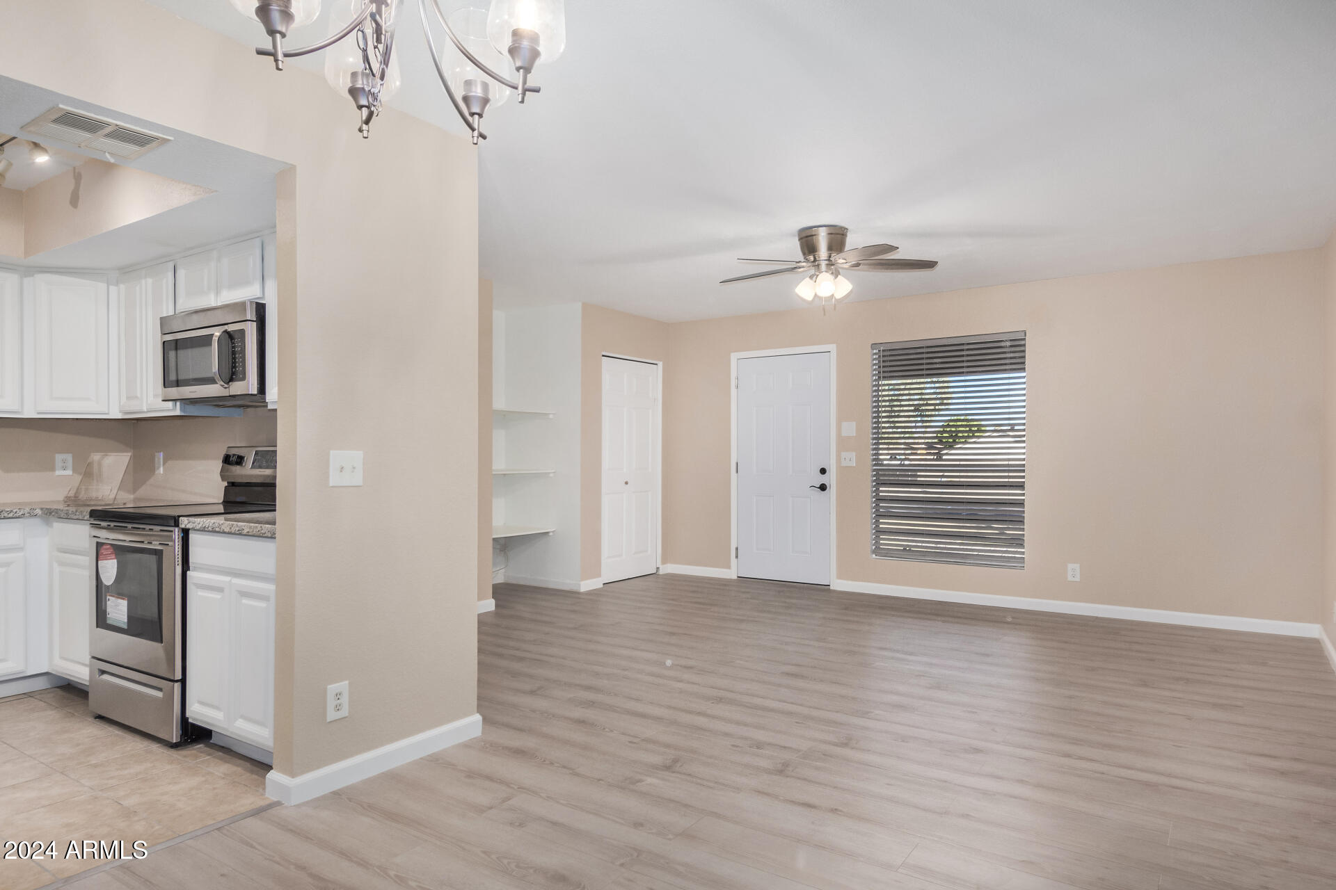 1340 North Recker Road, Unit 256 Mesa, AZ 85205 - Photo 6 of 25 kitchen entrance