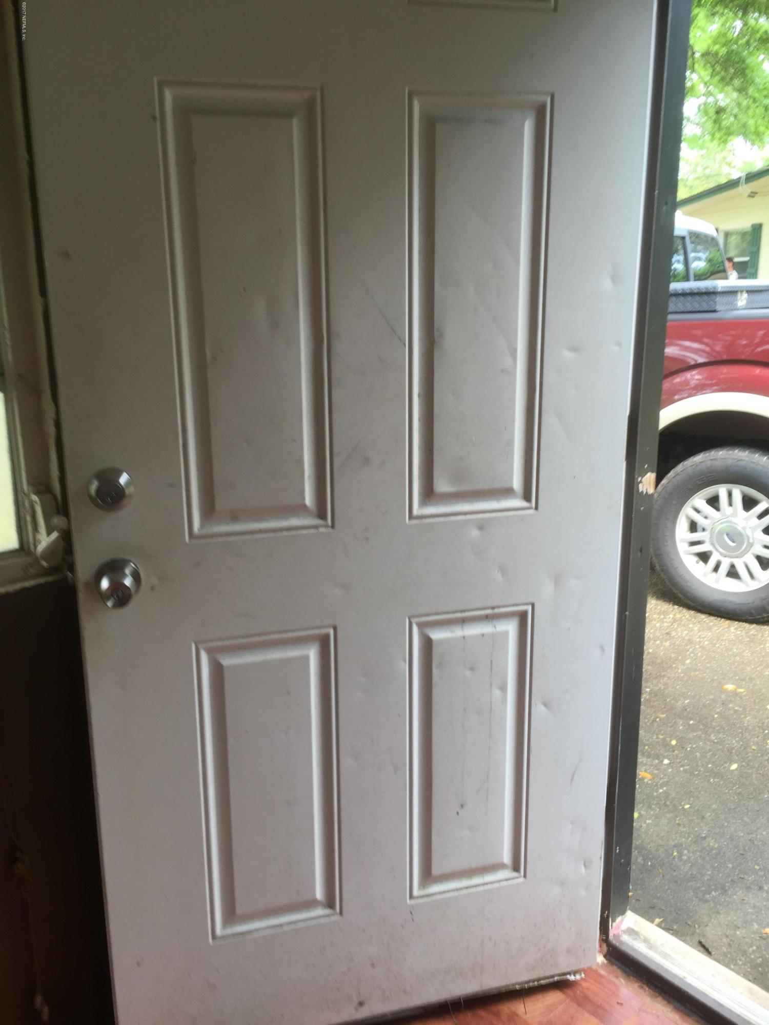 1427 King Arthur Road Jacksonville, FL 32211 - Photo 17 of 37 a view of front door of house