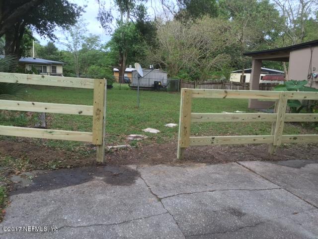 1427 King Arthur Road Jacksonville, FL 32211 - Photo 26 of 37 a view of a house with a backyard