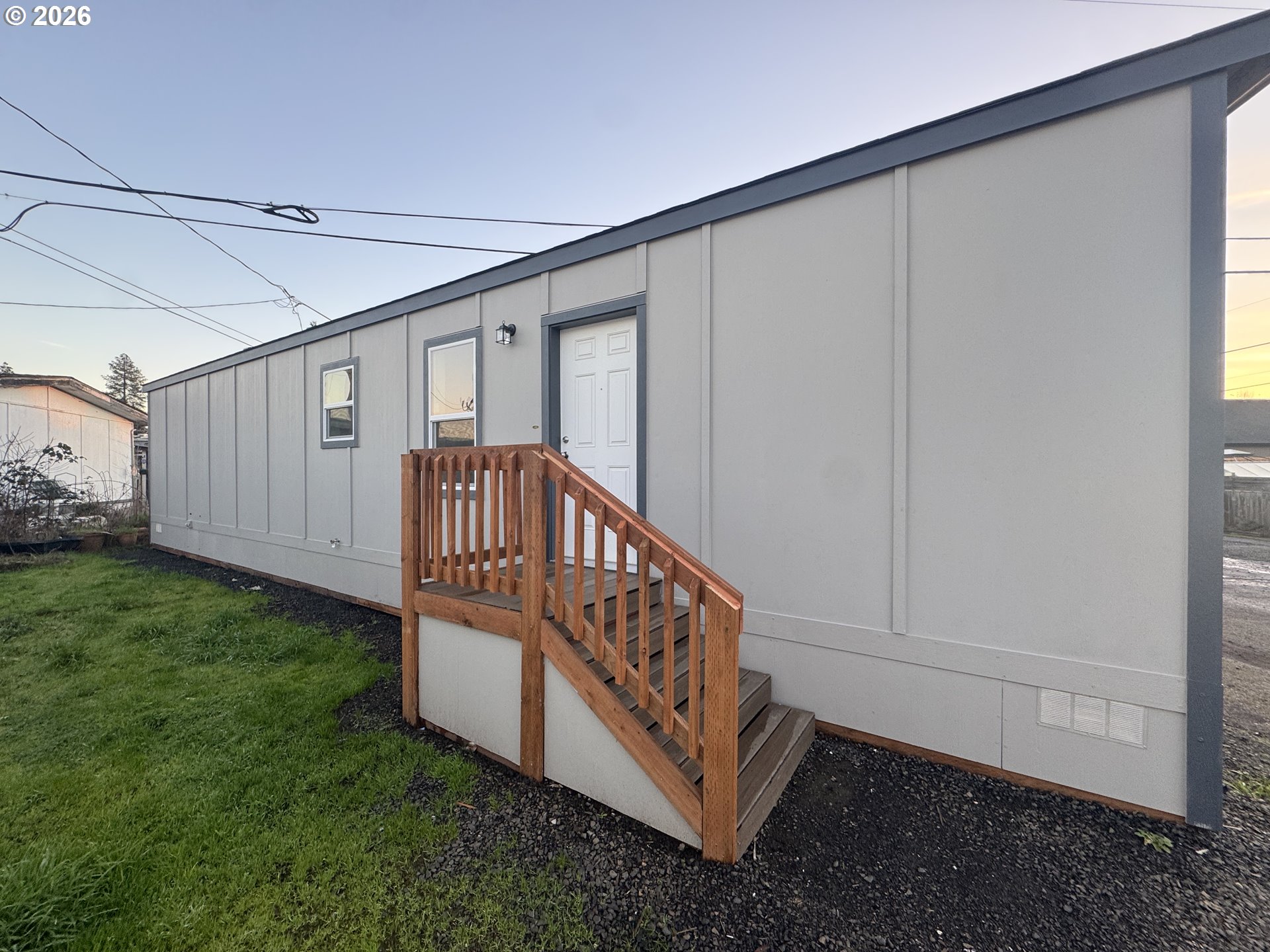1085 West 1st Avenue, Unit R Junction City, OR 97448 - Photo 1 of 14 a view of entryway with stairs