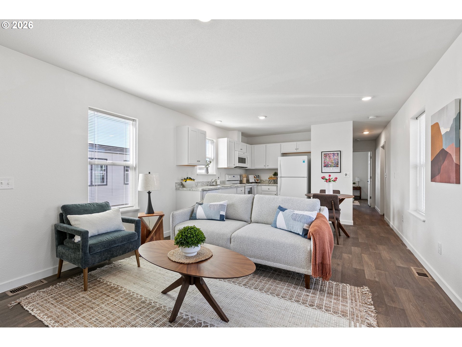 1085 West 1st Avenue, Unit R Junction City, OR 97448 - Photo 5 of 14 a living room with furniture and a wooden floor