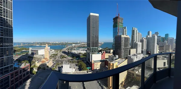 a view of a balcony with city view