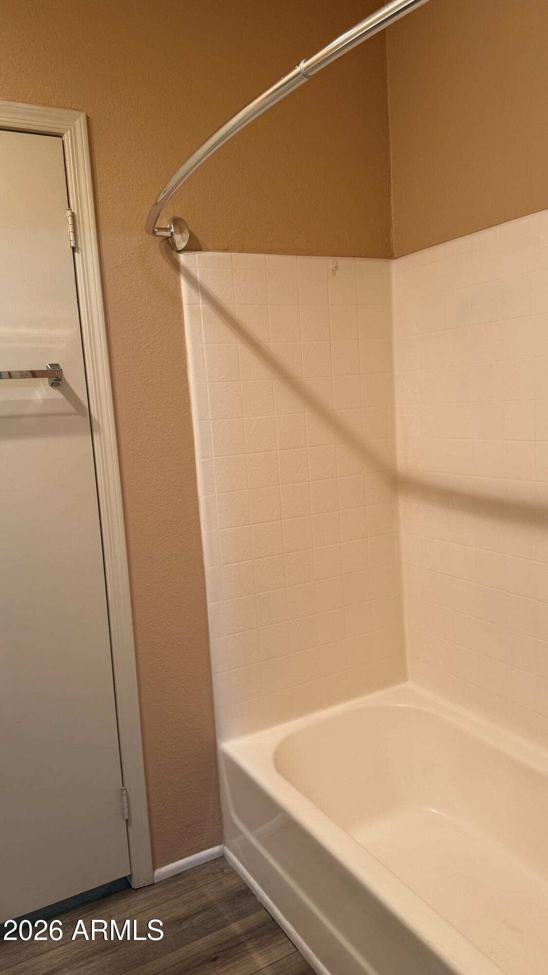 3700 South Tomahawk Road, Unit 95 Apache Junction, AZ 85119 - Photo 18 of 31 a bathroom with a shower and a bath tub