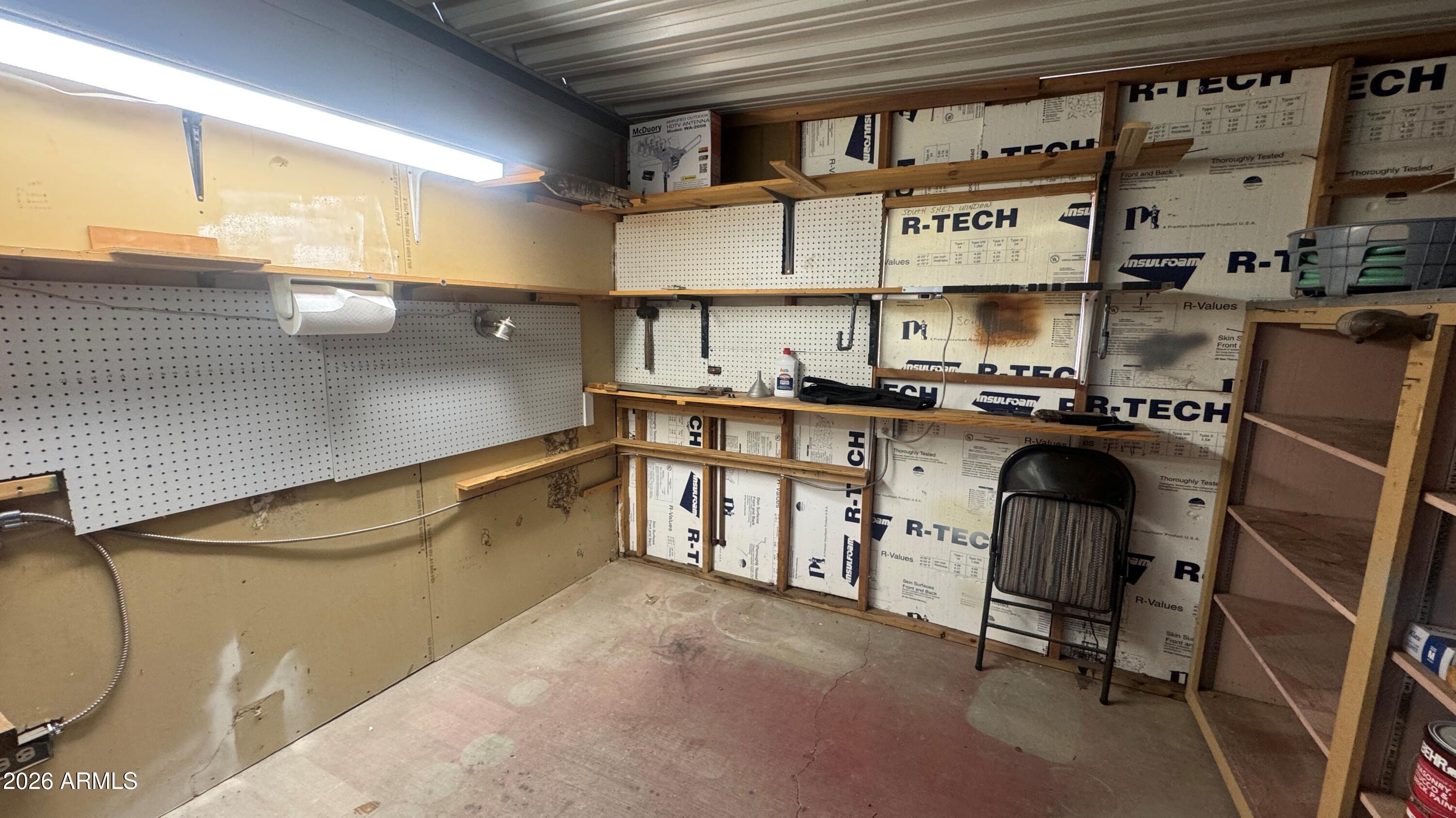 3700 South Tomahawk Road, Unit 95 Apache Junction, AZ 85119 - Photo 22 of 31 a kitchen with stainless steel appliances granite countertop a sink and cabinets