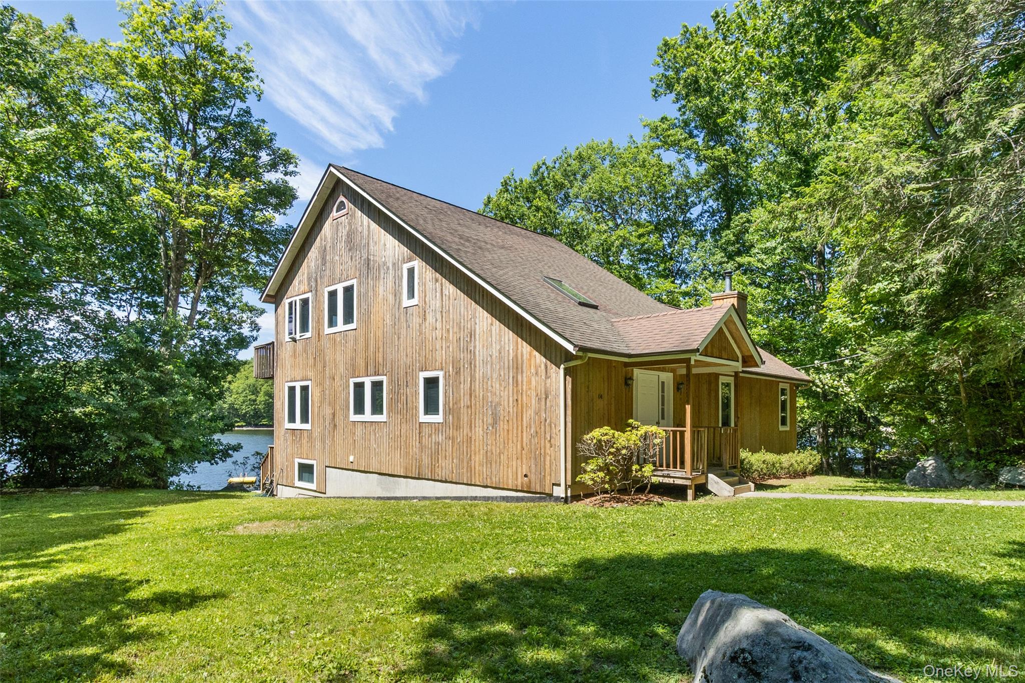64 Lillian Road Mahopac, NY 10541 - Photo 8 of 41 Level lawns and mature trees