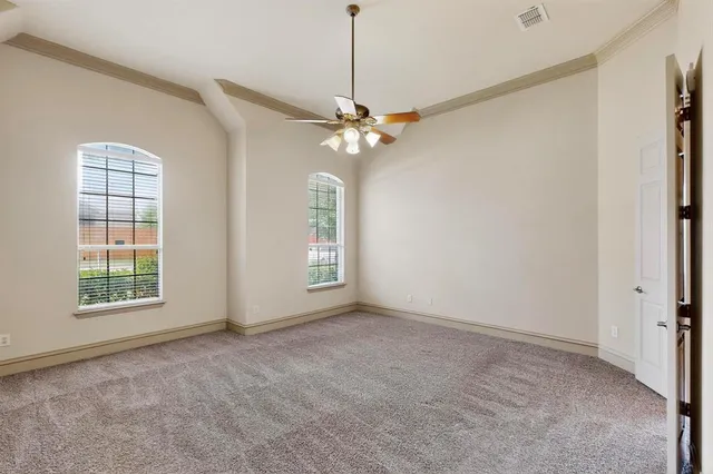 a kitchen that has a sink and a wooden floor