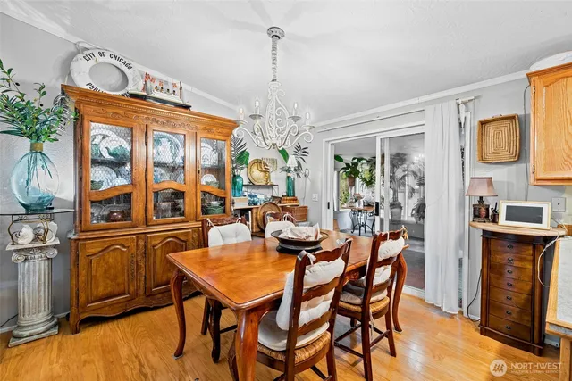 a bedroom with bed and a night stand