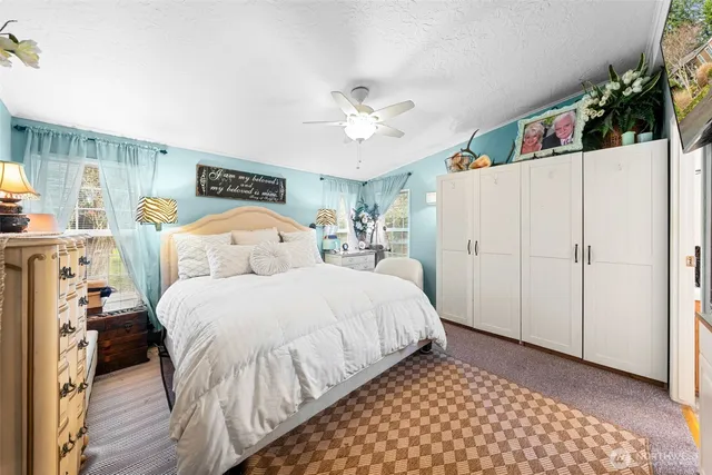 a en suite bathroom with double vanity and a shower