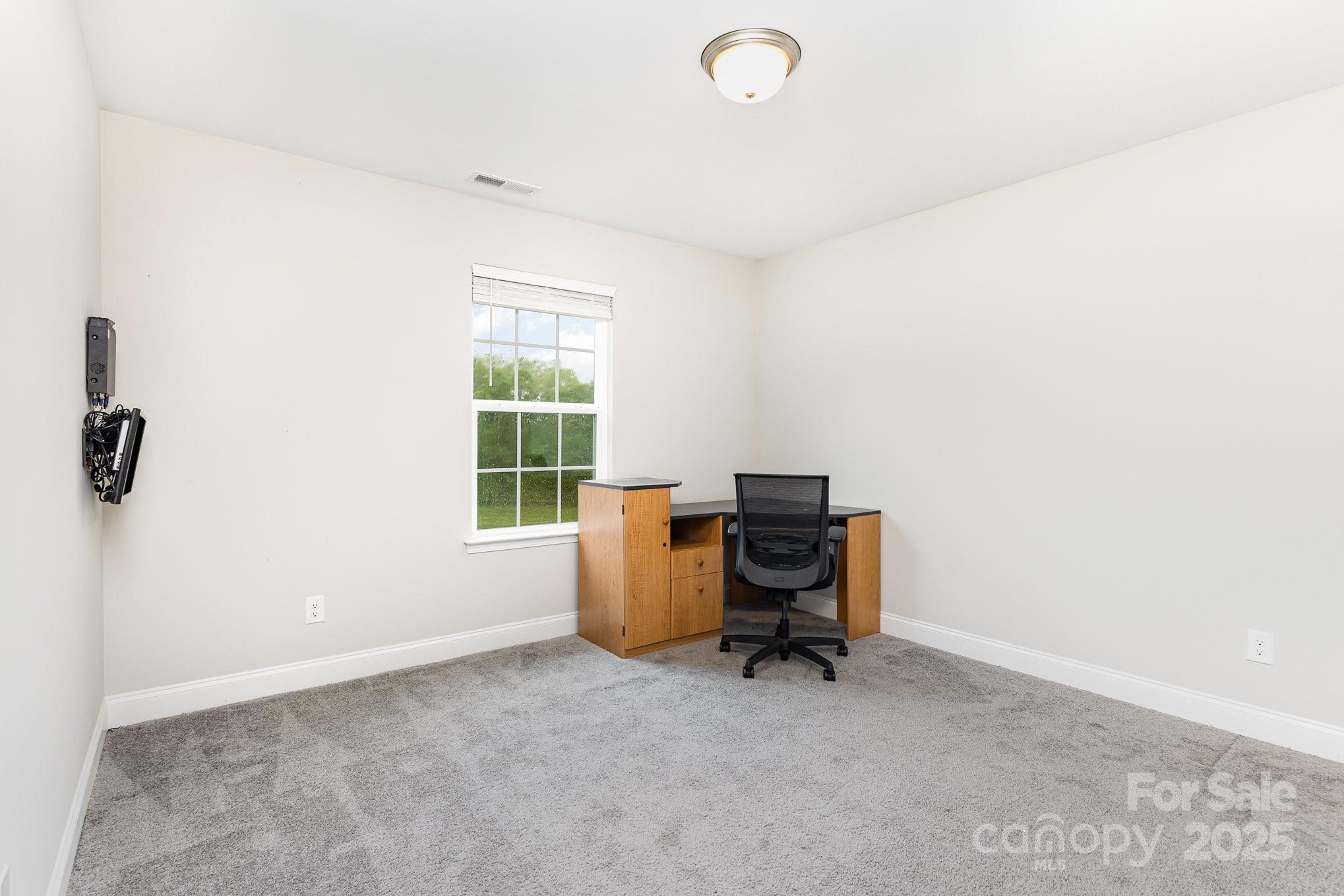 4026 Pigg Mattox Road Monroe, NC 28112 - Photo 12 of 31 a view of workspace with a window