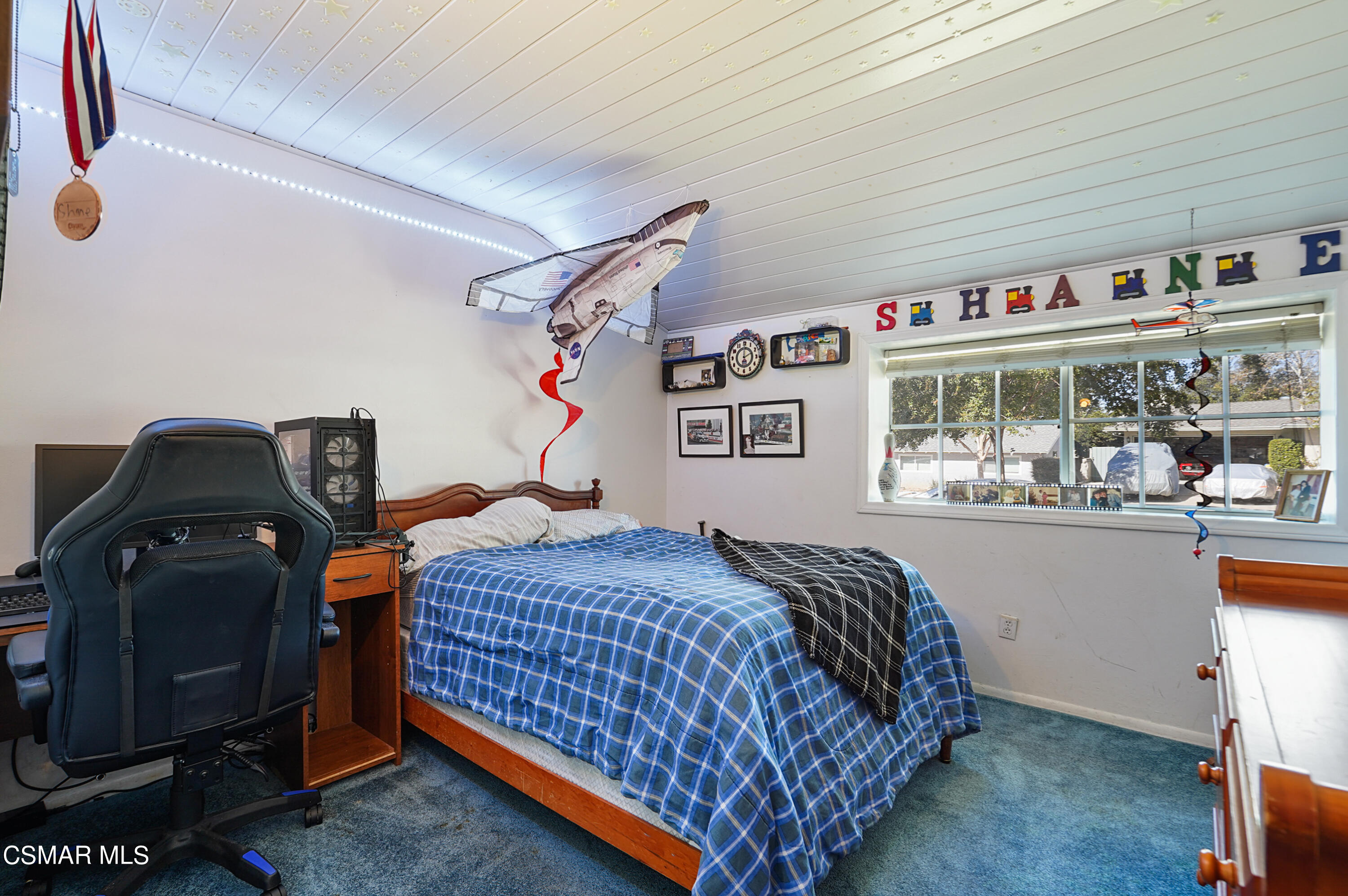 3148 Waco Avenue Simi Valley, CA 93063 - Photo 11 of 24 a bedroom with a bed and cabinets