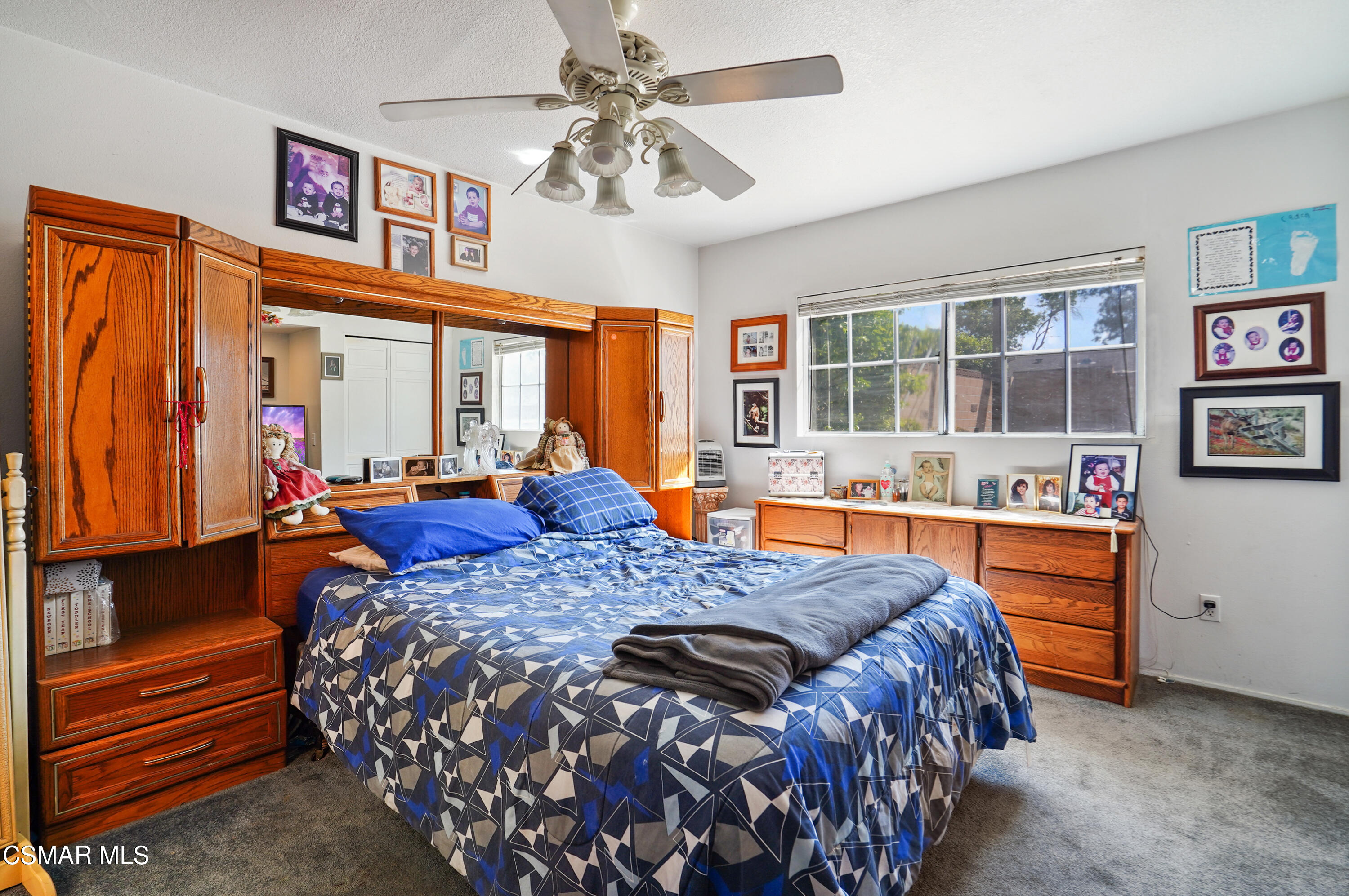 3148 Waco Avenue Simi Valley, CA 93063 - Photo 14 of 24 a bed room with a bed and furniture