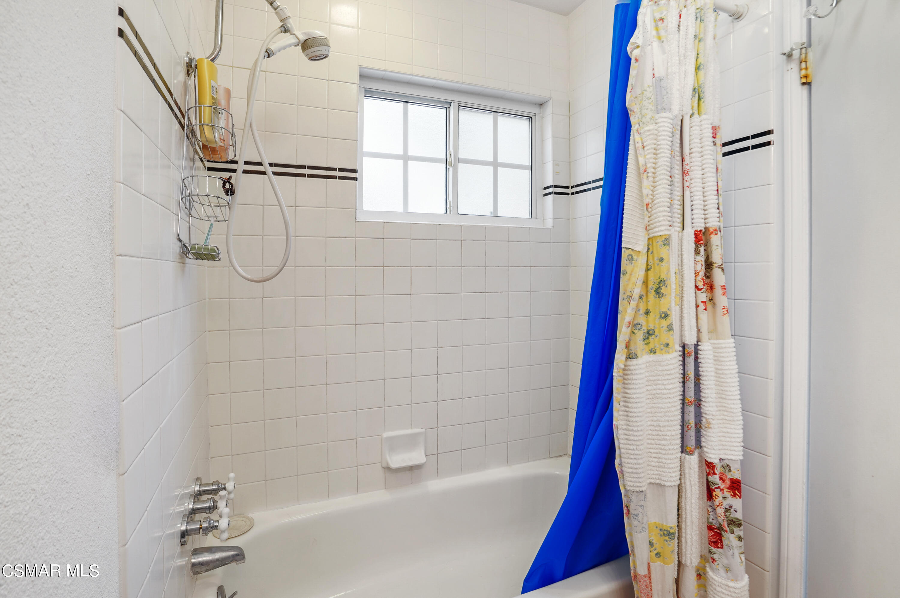 3148 Waco Avenue Simi Valley, CA 93063 - Photo 17 of 24 a bathroom with a bathtub and a shower